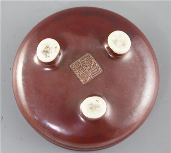 A Chinese faux bronze tripod censer, bearing a Qianlong seal mark, diameter 12.5cm